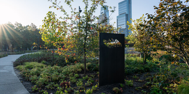 Calder Gardens sign and greenery