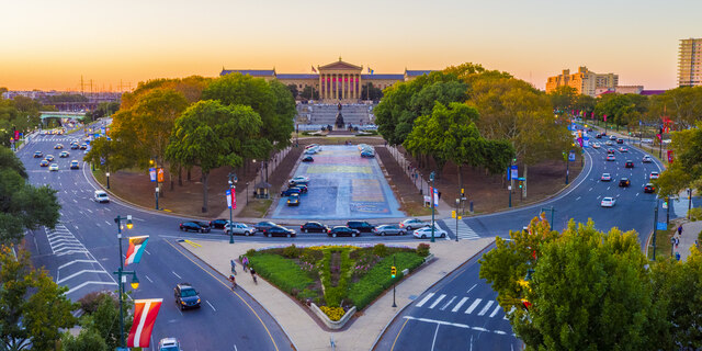 Benjamin Franklin Parkway at sunset with the PMA in the background.