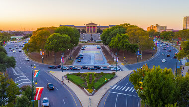 Photo of Benjamin Franklin Parkway at sunset. 