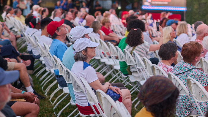 Crowd of people seated at event on Independence Mall