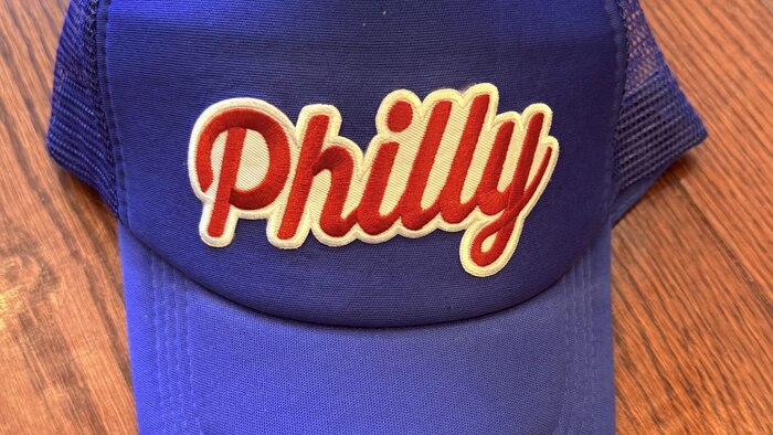 "Philly" patch on blue trucker hat