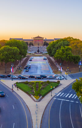 Photo of Benjamin Franklin Parkway at sunset. 